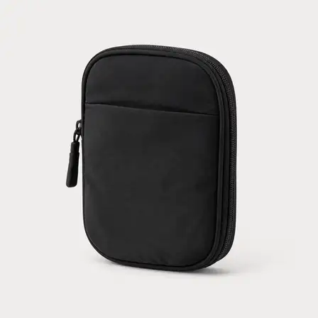 Studio photo of a fictional handbag.
