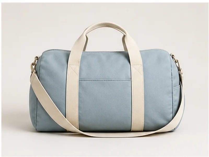 Realistic studio product photo of the pretend product Weekend Orbit Duffel.