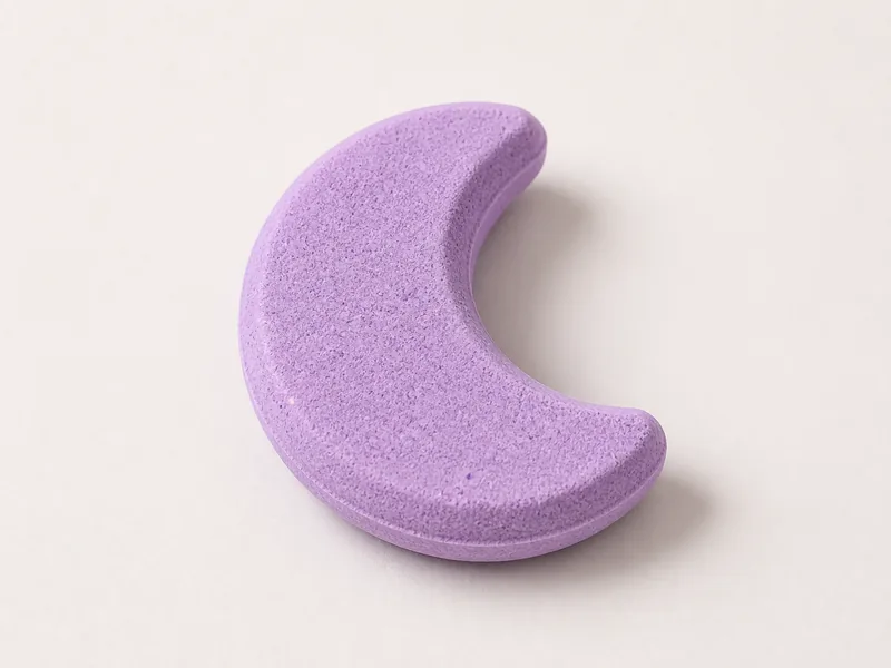 Generated generic product photo of a purple foam bath moon.