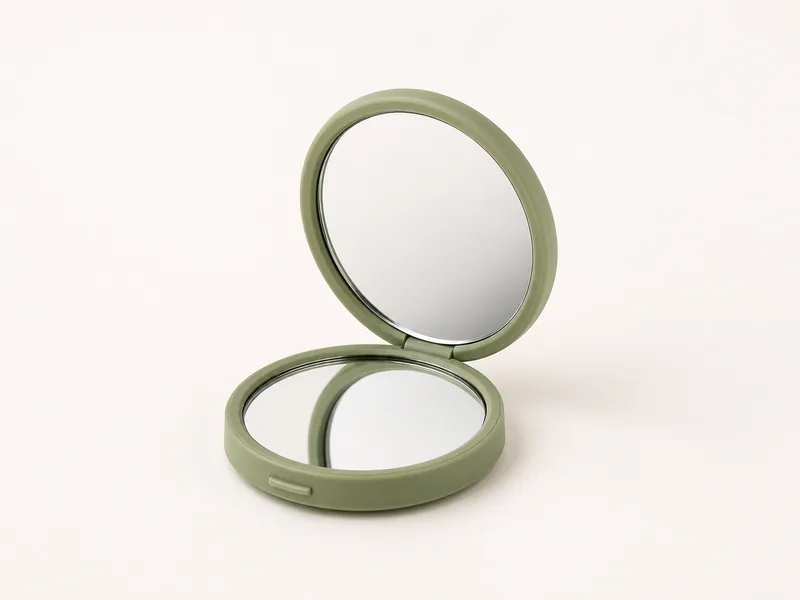 Generated generic product photo of a green mirror compact.